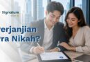 Sepasang kekasih calon pengantin modern tersenyum bersama saat pria menandatangani dokumen draf perjanjian pra nikah menggunakan pena digital di atas tablet.