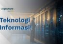 Staf TI memeriksa tablet di ruang server dengan pencahayaan navy dan emas